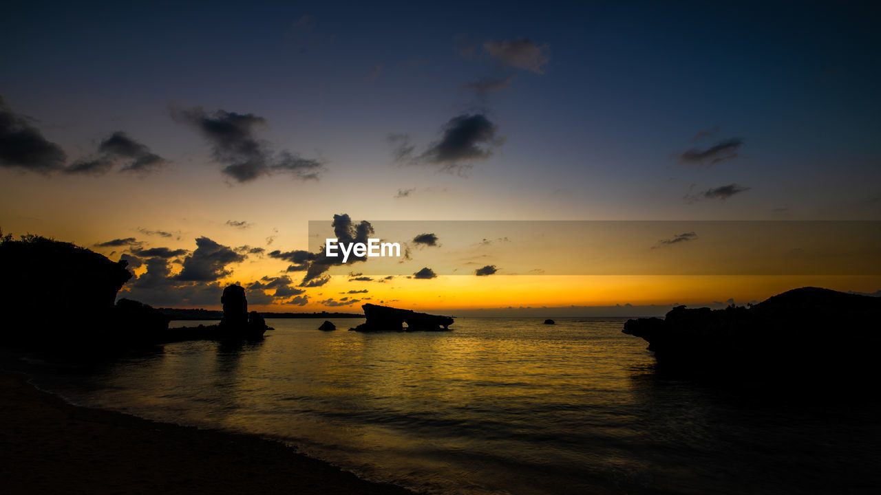 Scenic view of sea against sky during sunset