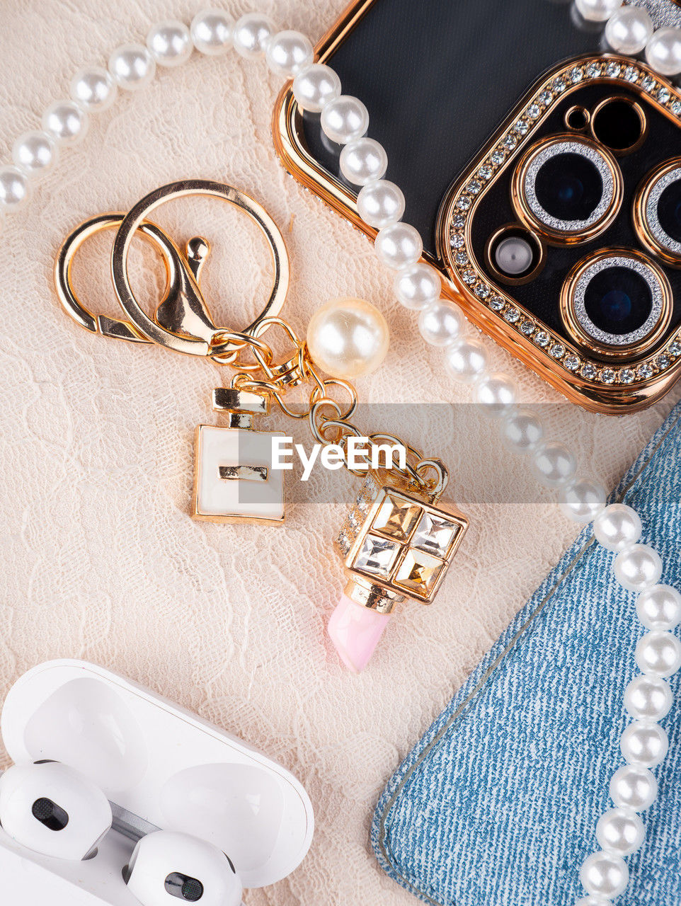 chain, jewellery, necklace, jewelry, indoors, high angle view, no people, fashion accessory, studio shot, still life, pendant, arts culture and entertainment, close-up, technology, fashion