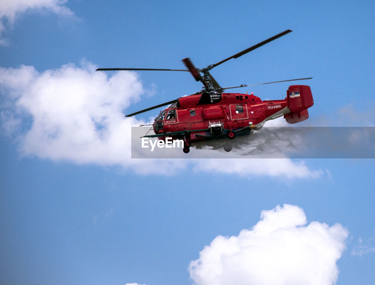 helicopter, air vehicle, transportation, flying, sky, mode of transportation, rotorcraft, cloud, vehicle, airplane, helicopter rotor, aircraft, nature, aviation, motion, military helicopter, propeller, on the move, mid-air, accidents and disasters, firefighter, rescue, blue, red, emergency services occupation, air force, coast guard, military, outdoors, day, hovering