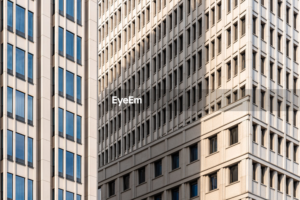 Full frame pattern of windows in office building. berlin, germany. abstract background