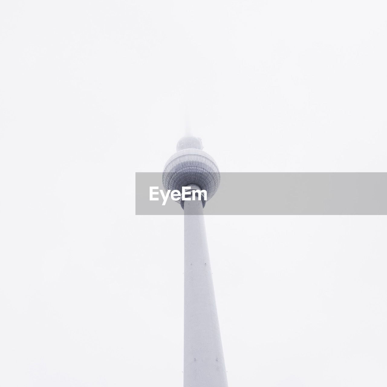 Low angle view of fernsehturm against clear sky