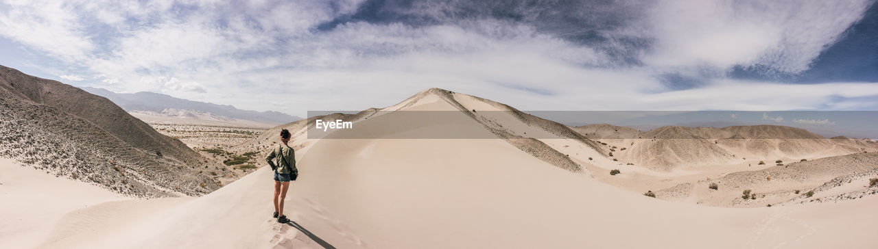 Panoramic view of arid landscape against sky