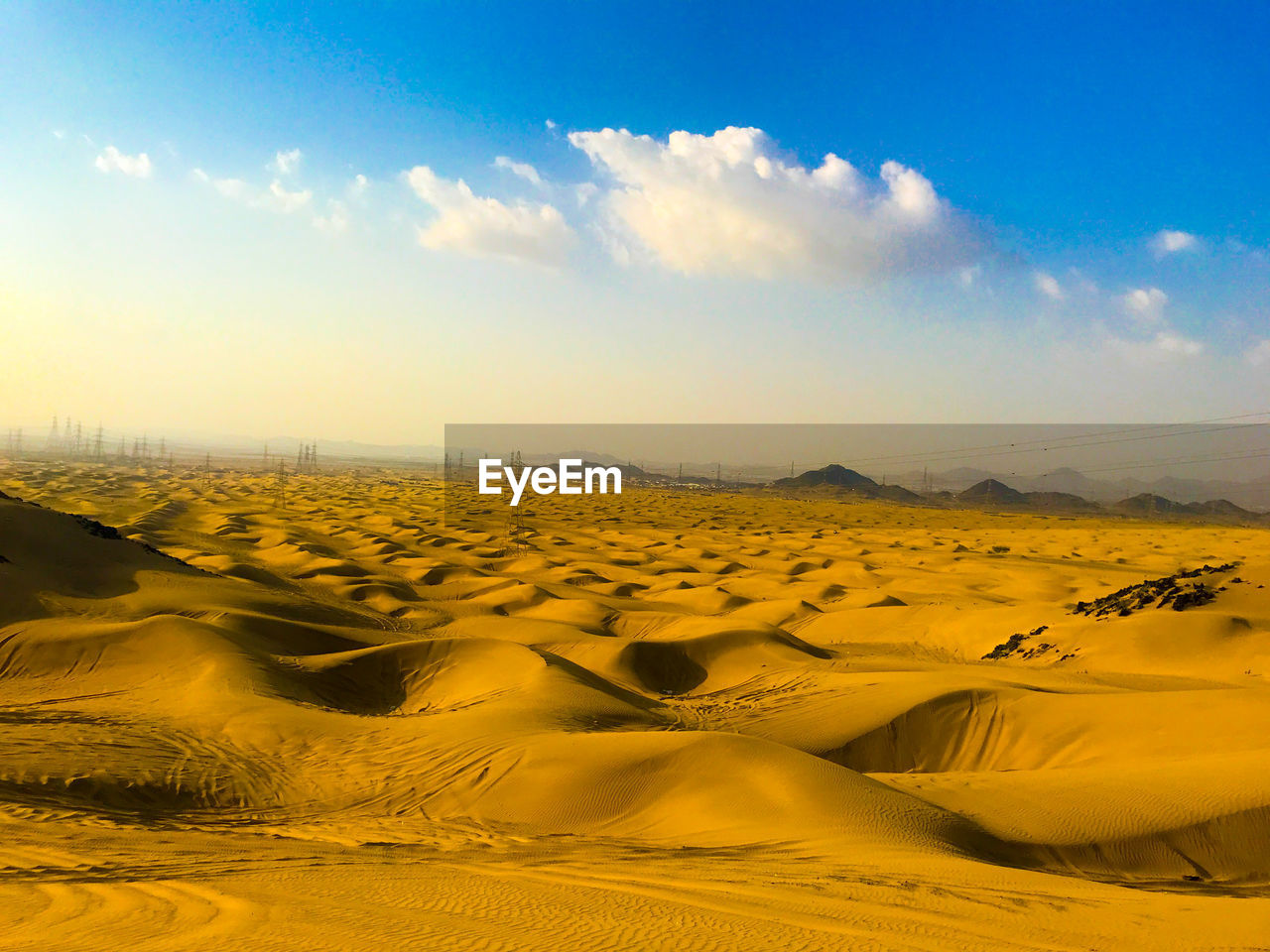 Scenic view of desert against sky