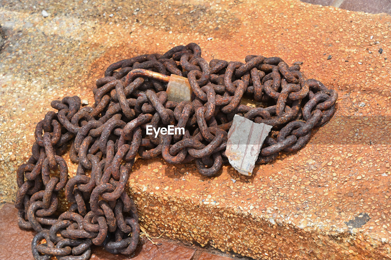 Close-up of rusty chain outdoors