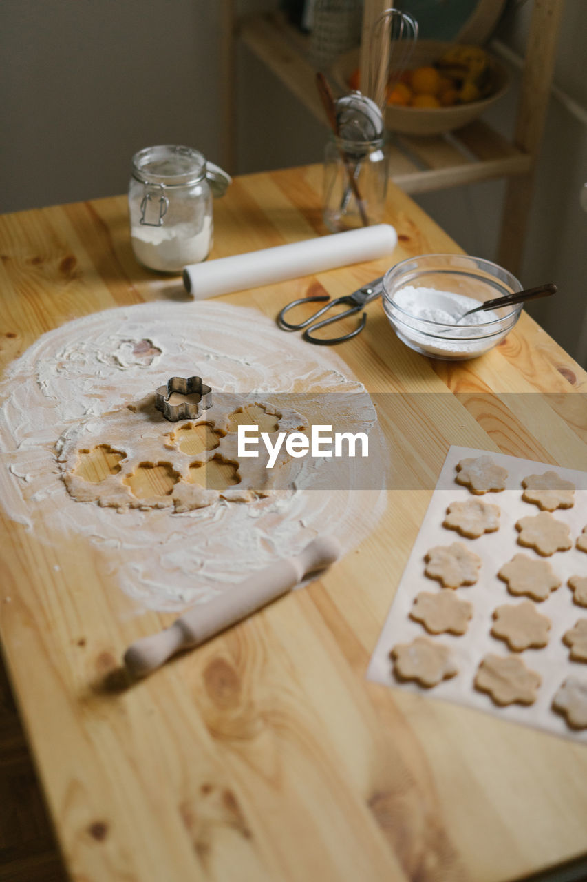 Young woman making christmas cookies