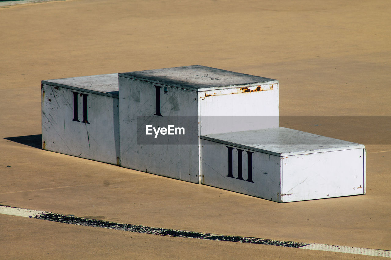 HIGH ANGLE VIEW OF BUILDING ON TABLE AT BEACH