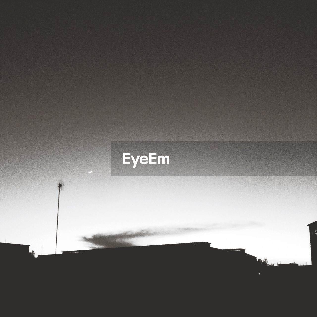 Sky over silhouettes of buildings