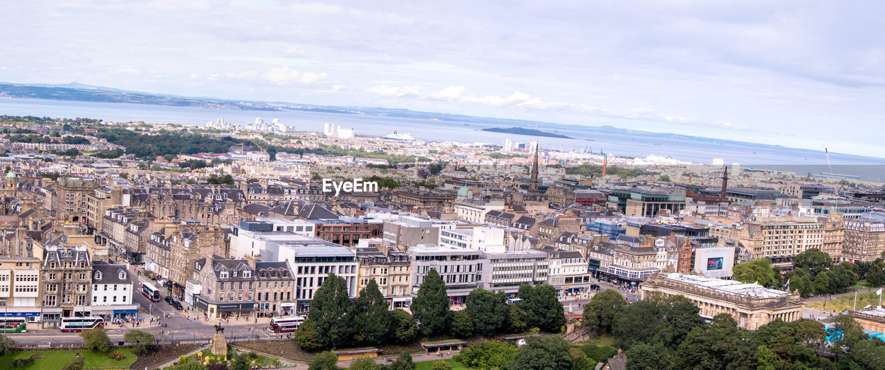 HIGH ANGLE VIEW OF TOWNSCAPE AND BUILDINGS IN CITY