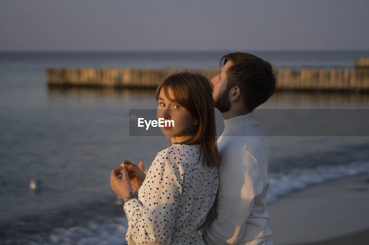 Kaliningrad, russia. young couple in love on the seaside