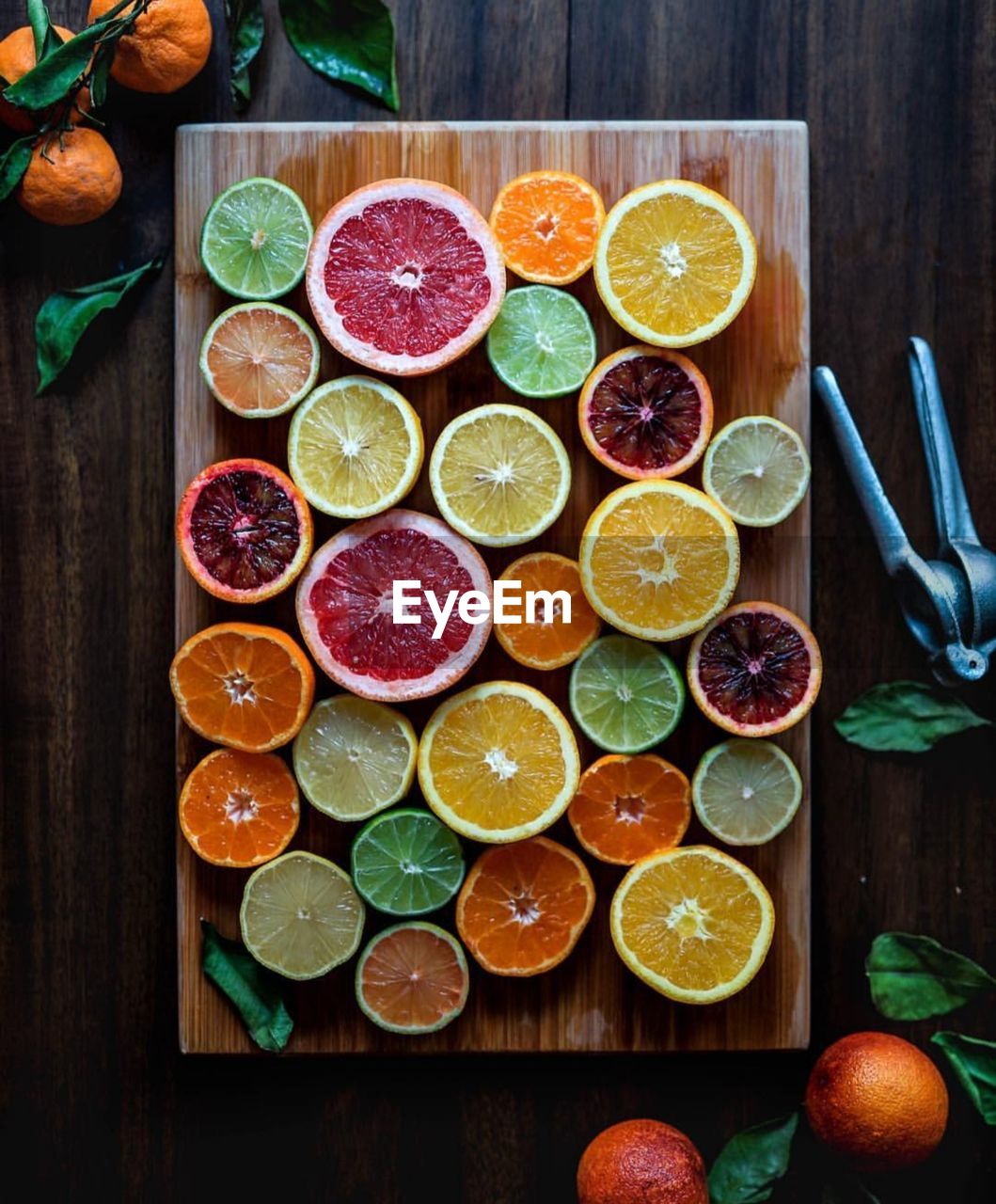 Directly above shot of various citrus fruits on cutting board