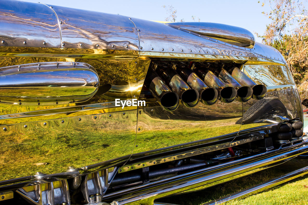 Reflection of field on vintage car