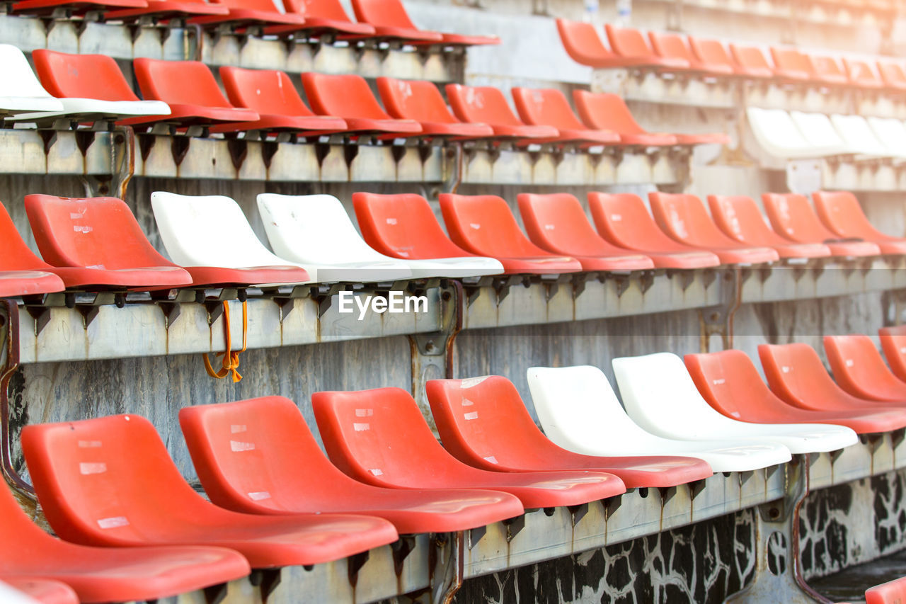 Full frame shot of empty seats in stadium