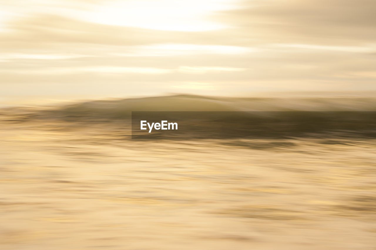 CLOSE-UP OF WATER AGAINST SKY