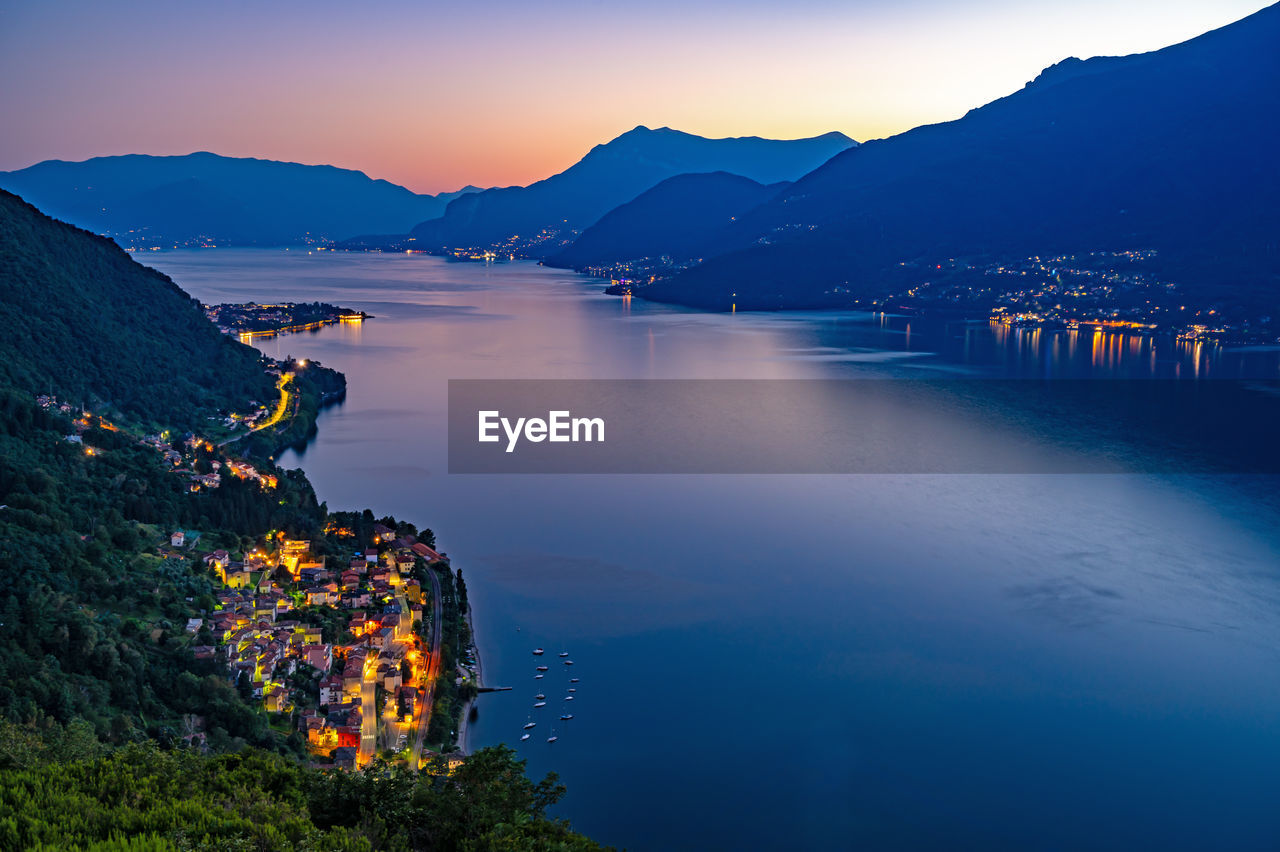 A view of lake como from the church of san rocco, in dorio, towards the south, at dusk