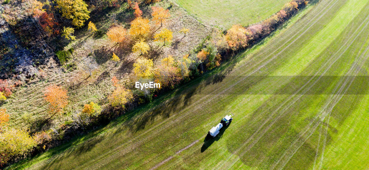 high angle view of people walking on landscape