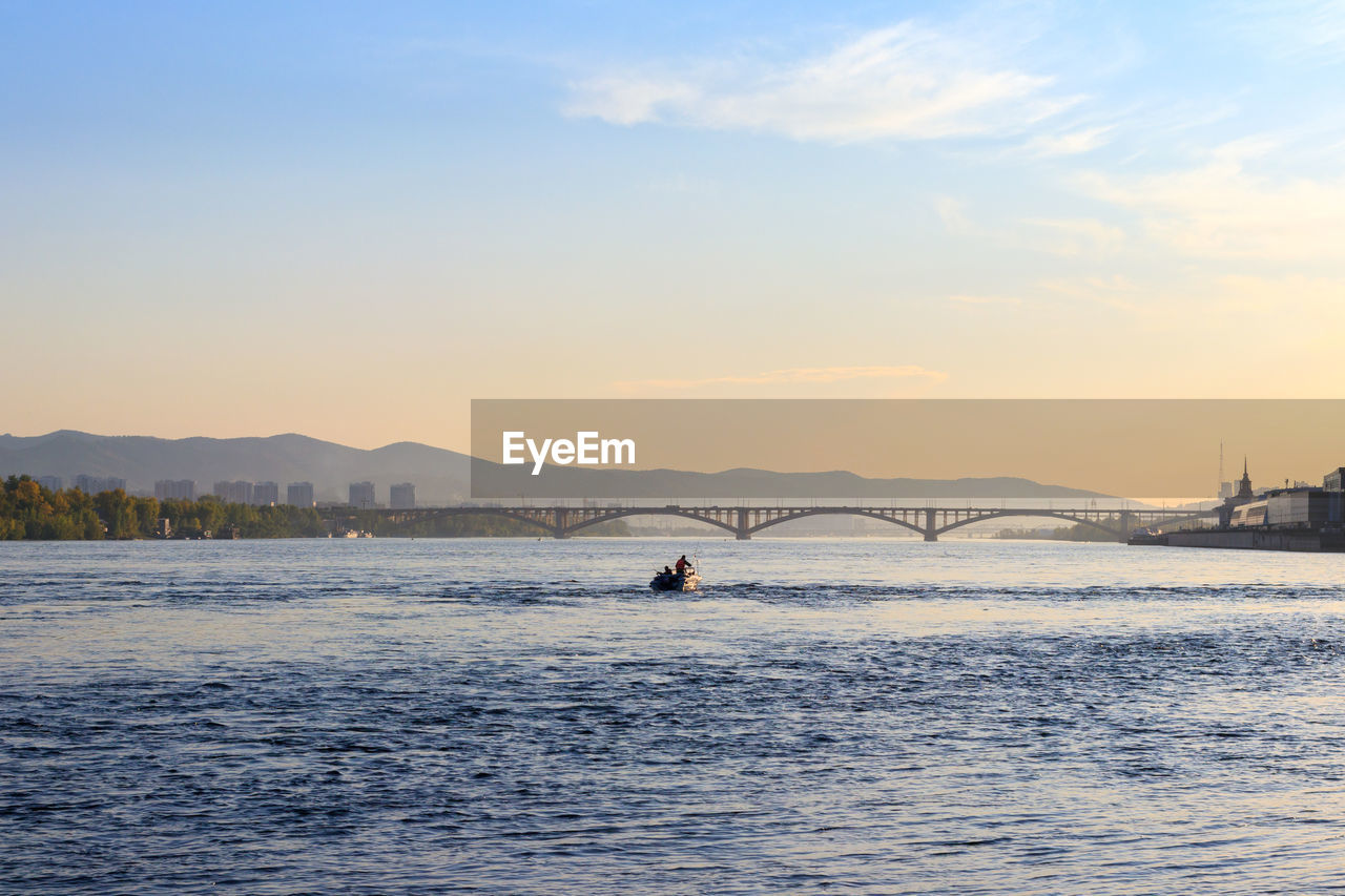 SCENIC VIEW OF SEA DURING SUNSET