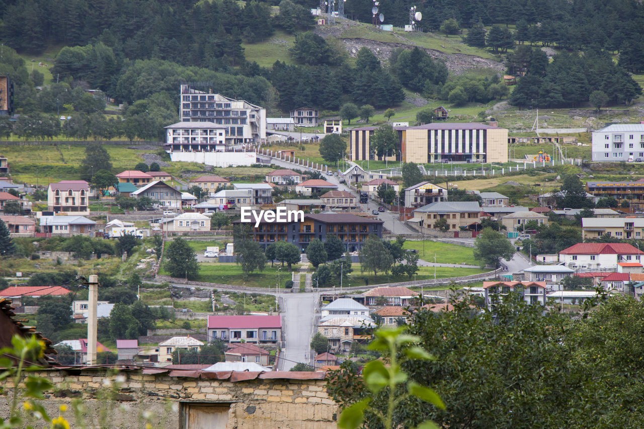 City view of stepantsminda, georgia. old houses and mountain view.