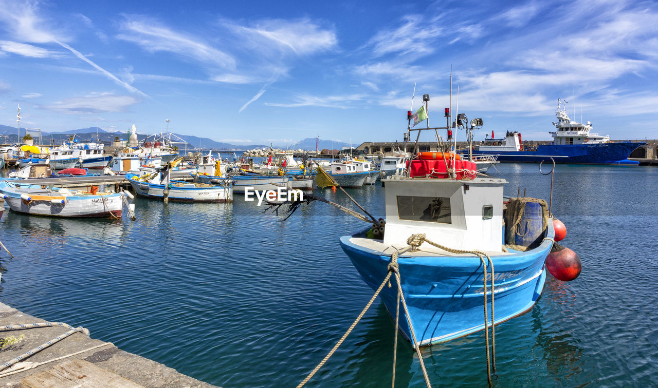 FISHING BOATS IN HARBOR AT PORT