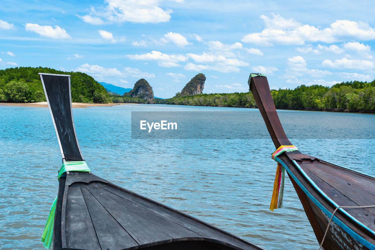 SCENIC VIEW OF SEA AGAINST SKY SEEN FROM BOAT