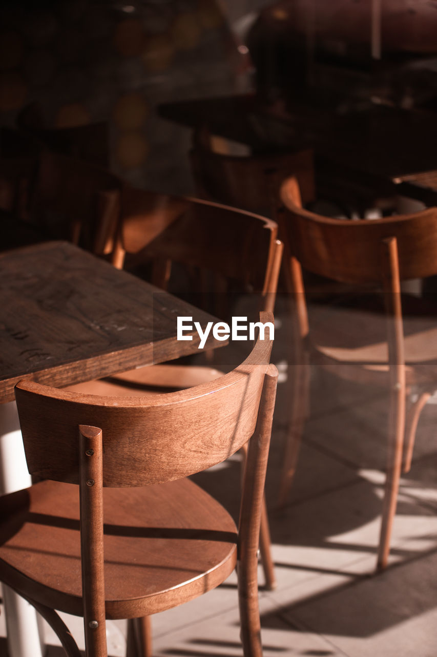 Empty chairs and table in restaurant