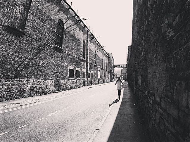 VIEW OF ROAD ALONG BUILDINGS