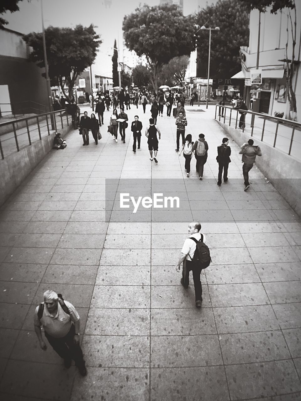 People walking on street in city