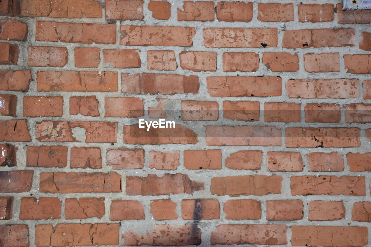 DETAIL SHOT OF BRICK WALL