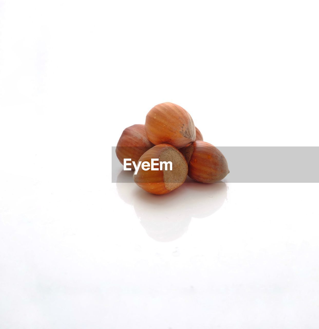 Close-up of nuts against white background