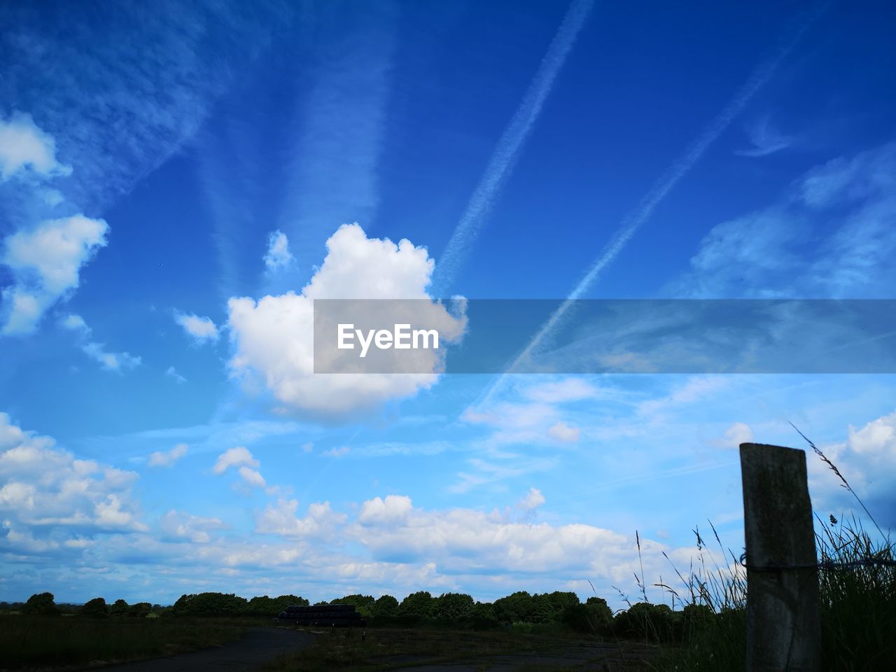 SCENIC VIEW OF VAPOR TRAILS IN SKY