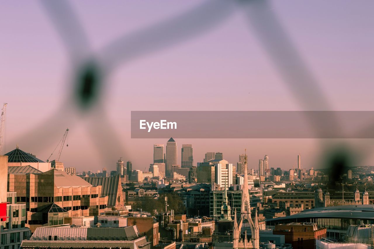 High angle shot of cityscape against clear sky