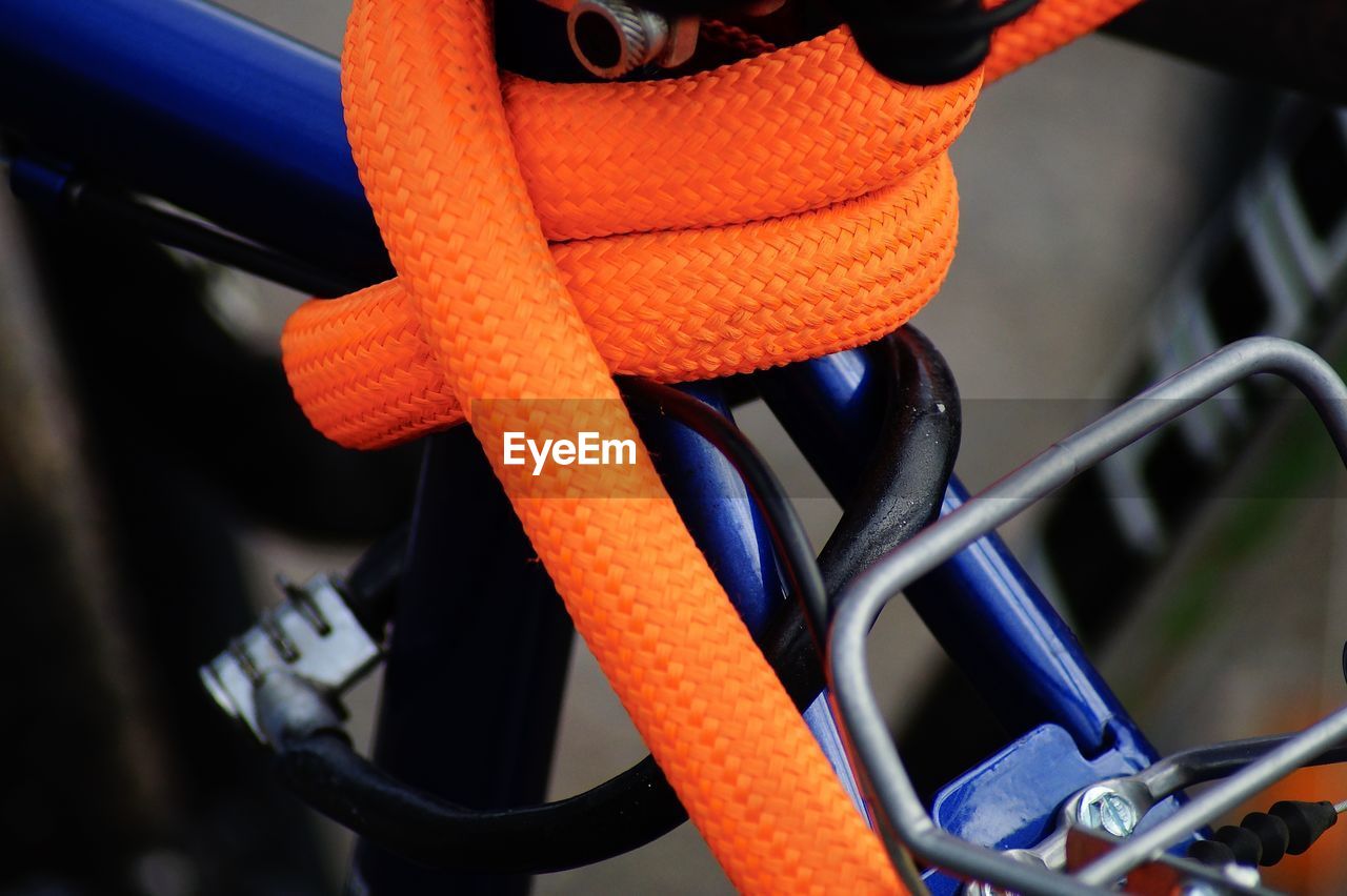 Close-up of rope tied on bicycle