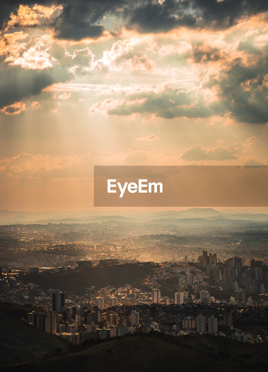 Cityscape against sky during sunset