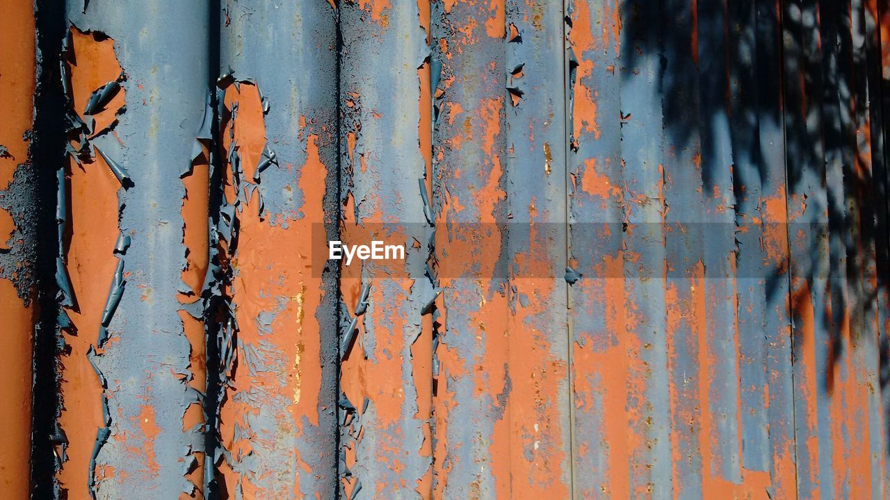 Sunlight falling on corrugated iron