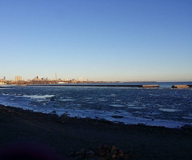 VIEW OF CALM SEA AGAINST CLEAR SKY