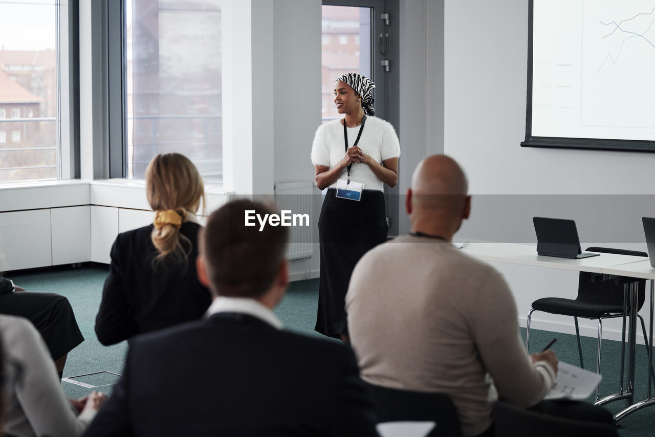 Woman having presentation during business meeting