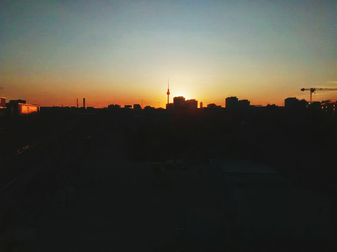 Cityscape silhouette at sundown