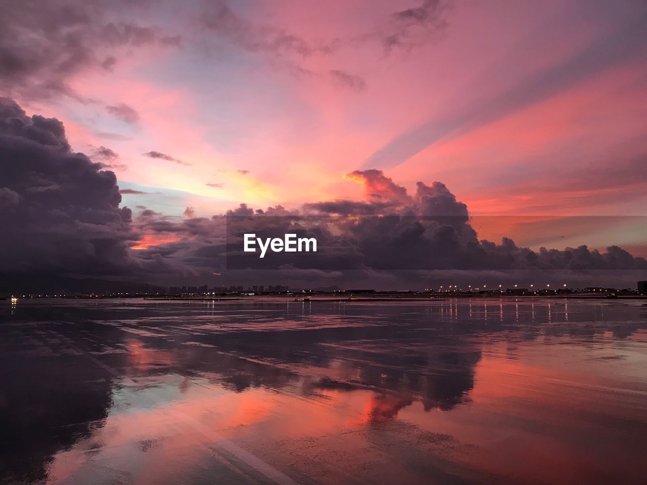 Scenic view of sea against sky during sunset