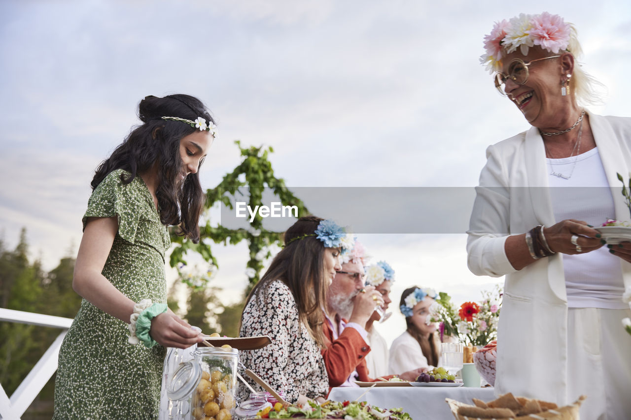 Family having midsummer dinner