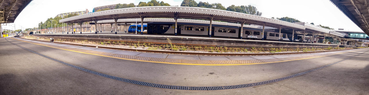 RAILROAD STATION PLATFORM IN CITY