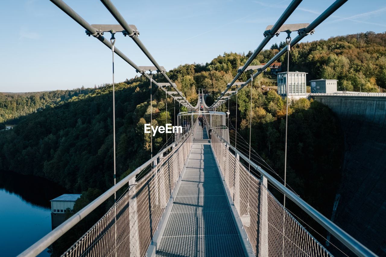 Footbridge against sky