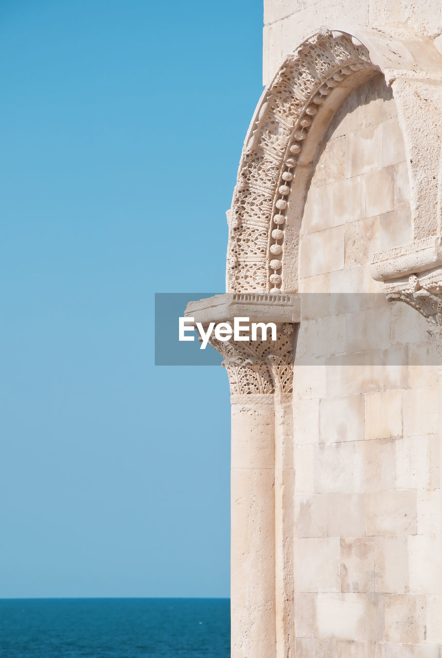 Detail of arch of trani churc in italy