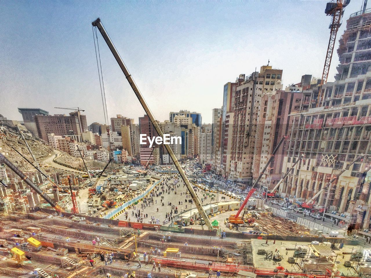 High angle view of construction site against buildings in city