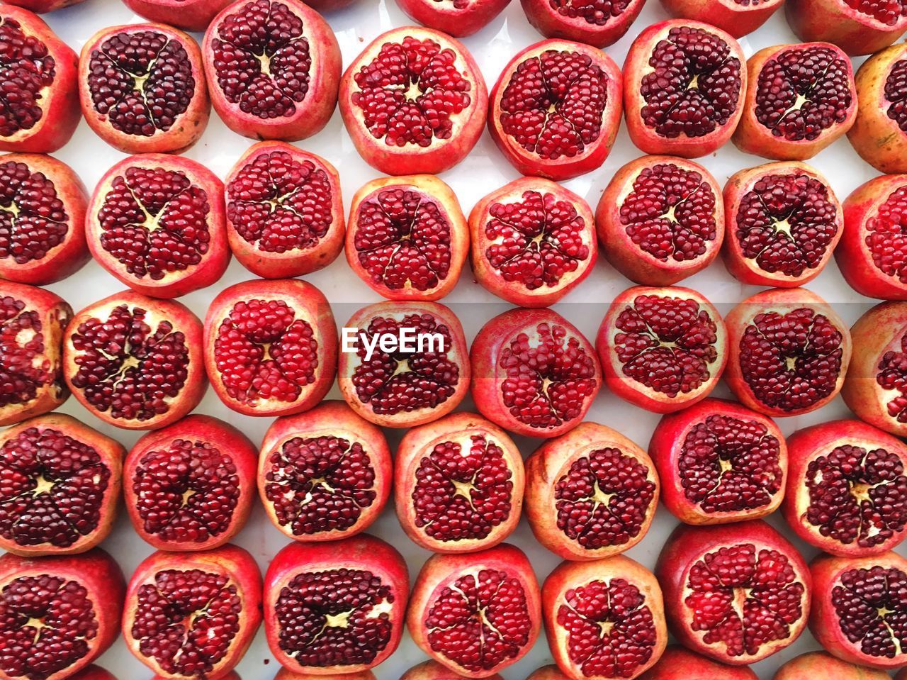 Full frame shot of cut pomegranates