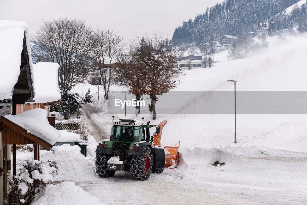 SNOW COVERED LAND ON FIELD