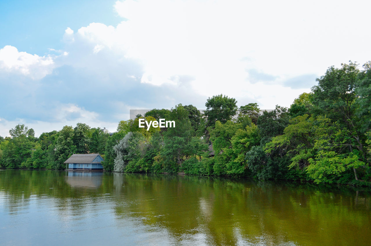 SCENIC VIEW OF LAKE AGAINST TREES