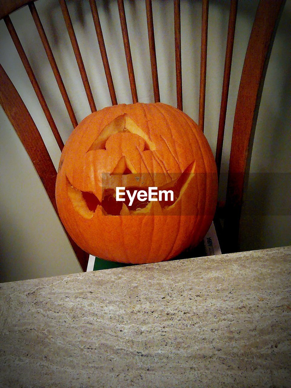 Halloween pumpkin on chair