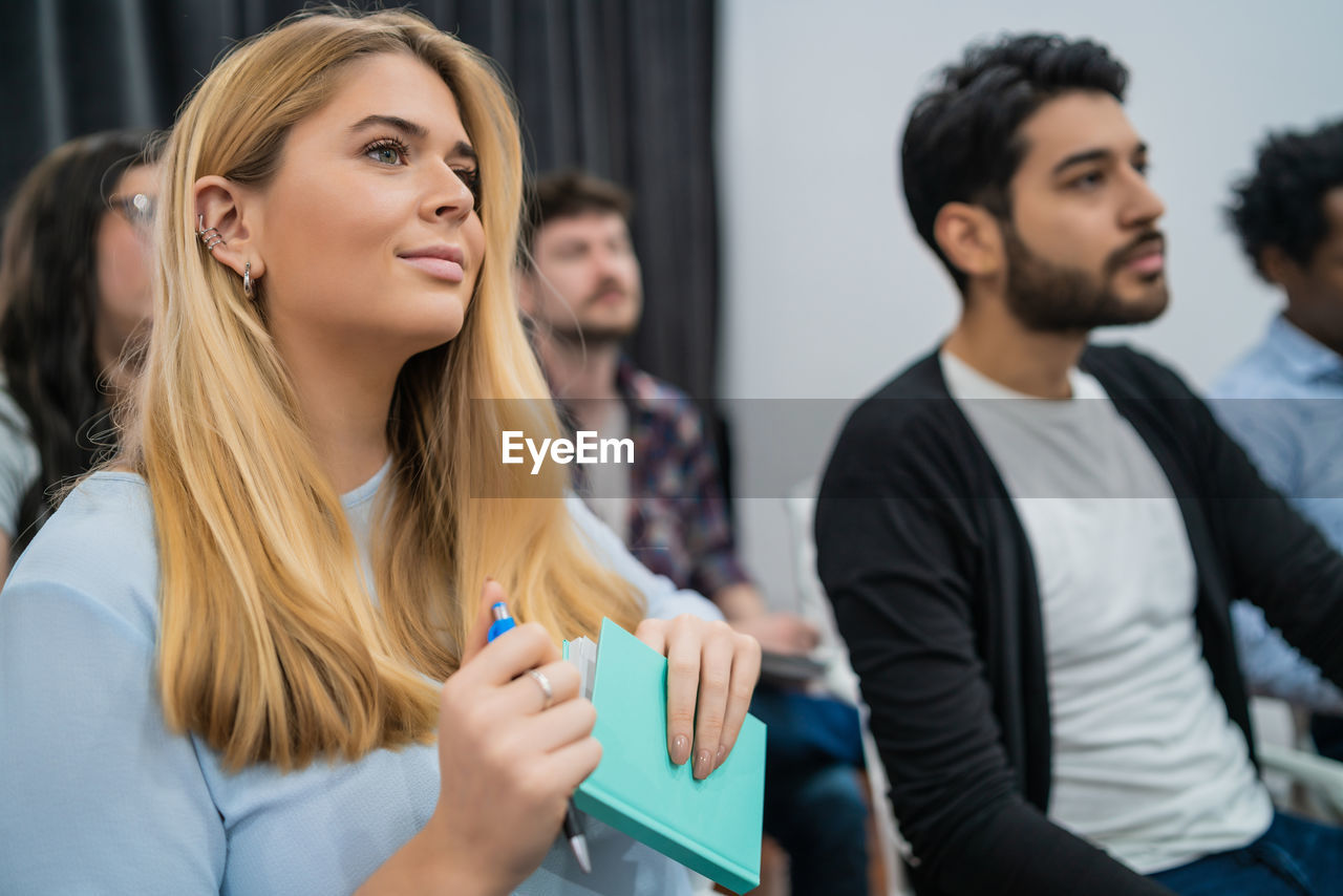 People sitting on chair during meeting