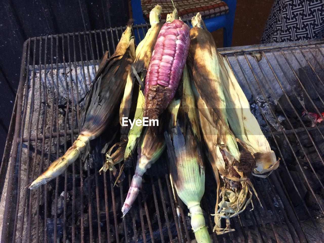 High angle view of corn on barbeque