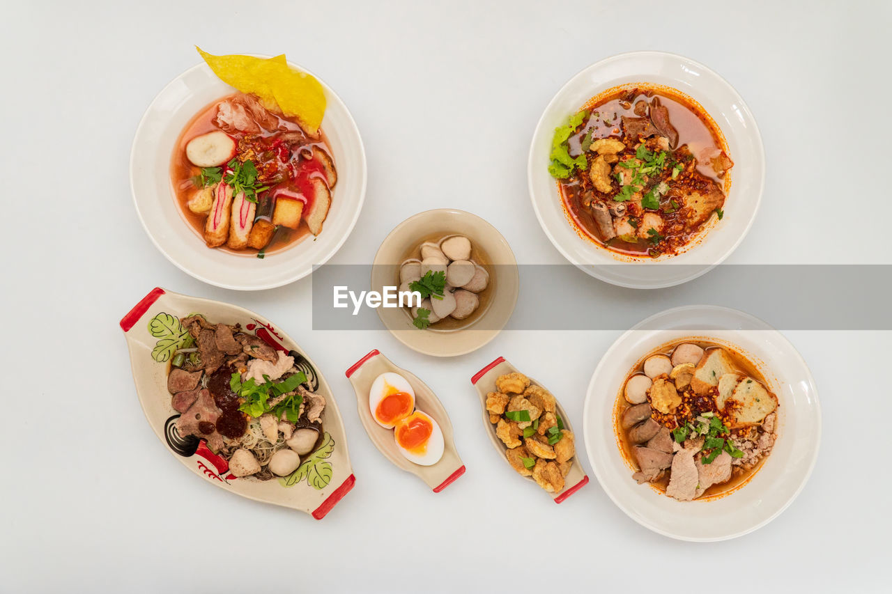 food and drink, food, healthy eating, dish, vegetable, freshness, wellbeing, meat, studio shot, bowl, meal, cuisine, asian food, high angle view, indoors, no people, variation, plate, directly above, still life, produce, chinese food, dinner