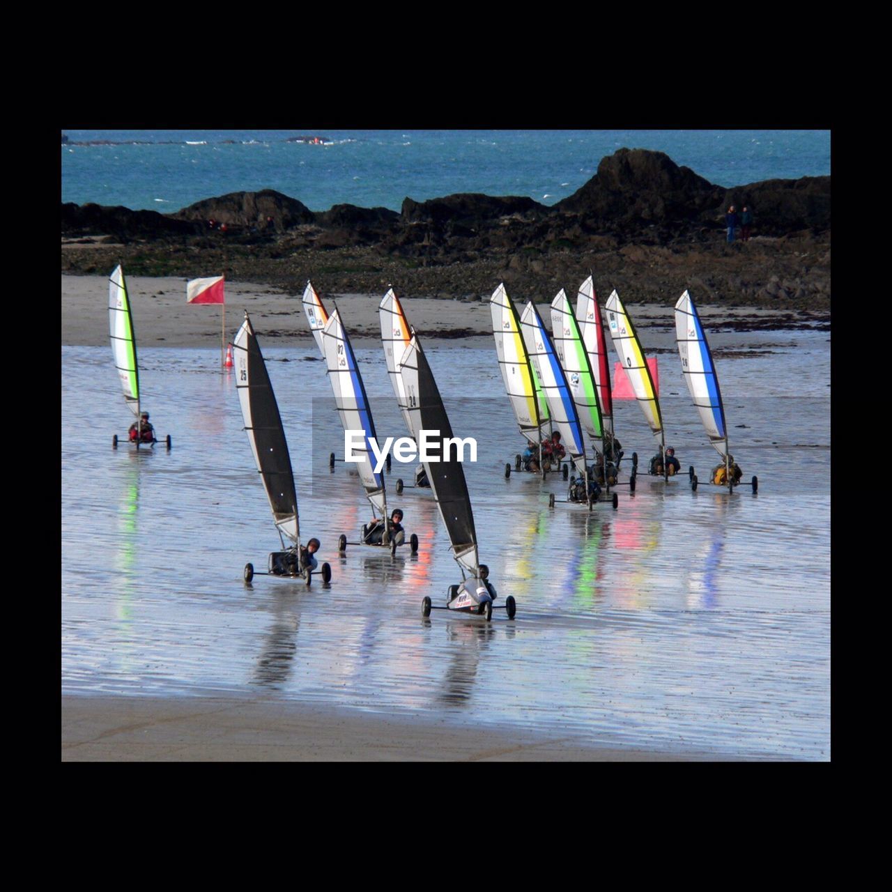 People land sailing at beach